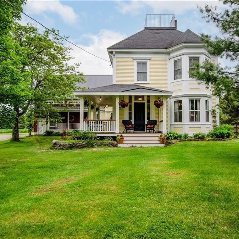 Shorebird Landing, a restored heritage house with a wraparound porch