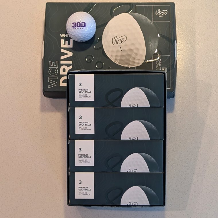 Two boxes of 300 Project branded Vice golf balls